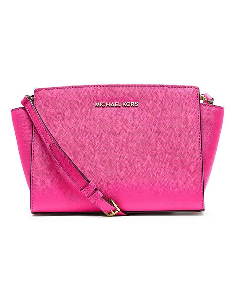 michael kors light pink messenger bag leather last season|Michael Kors leather handbags.